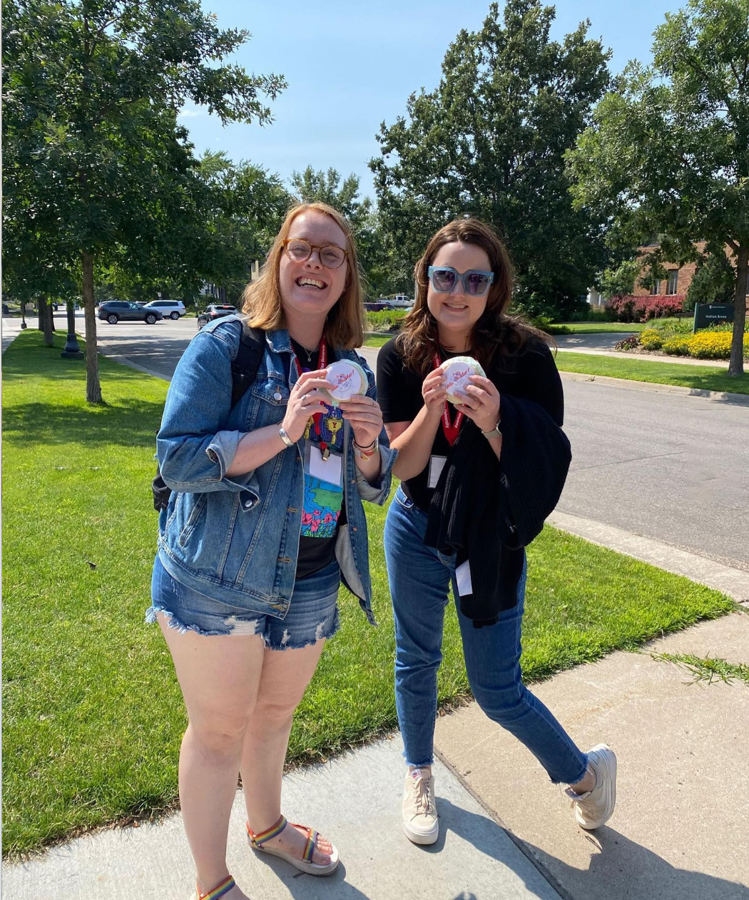 Two MFAC (MFA in Writing for Children and Young Adults) students taking a break for ice cream, during a residency