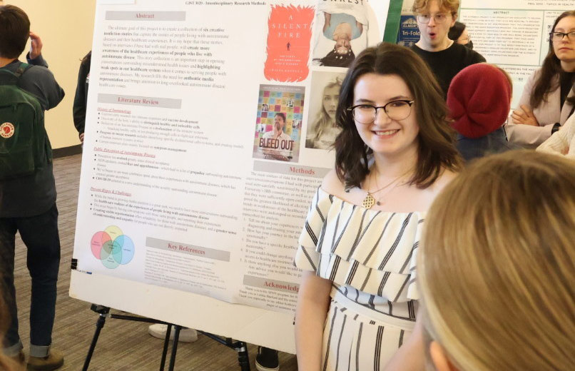 Student presenting work at the Hamline Student Research Spring Showcase and Symposium